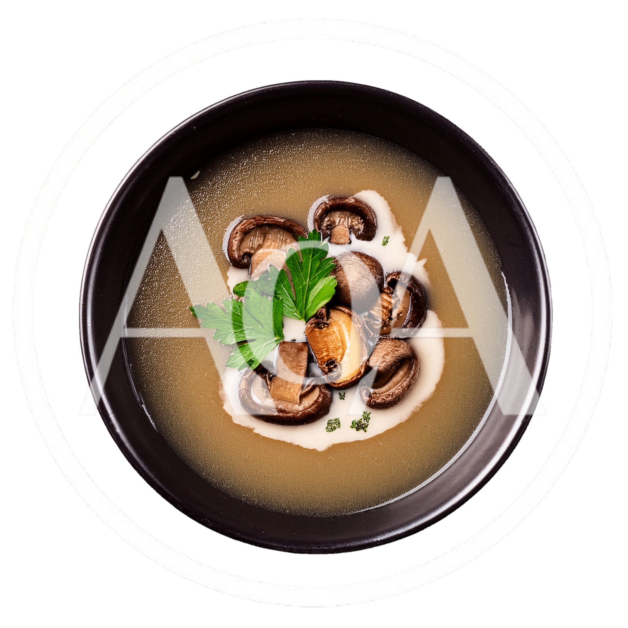 Mushroom Soup With Cream And Fresh Parsley Garnish