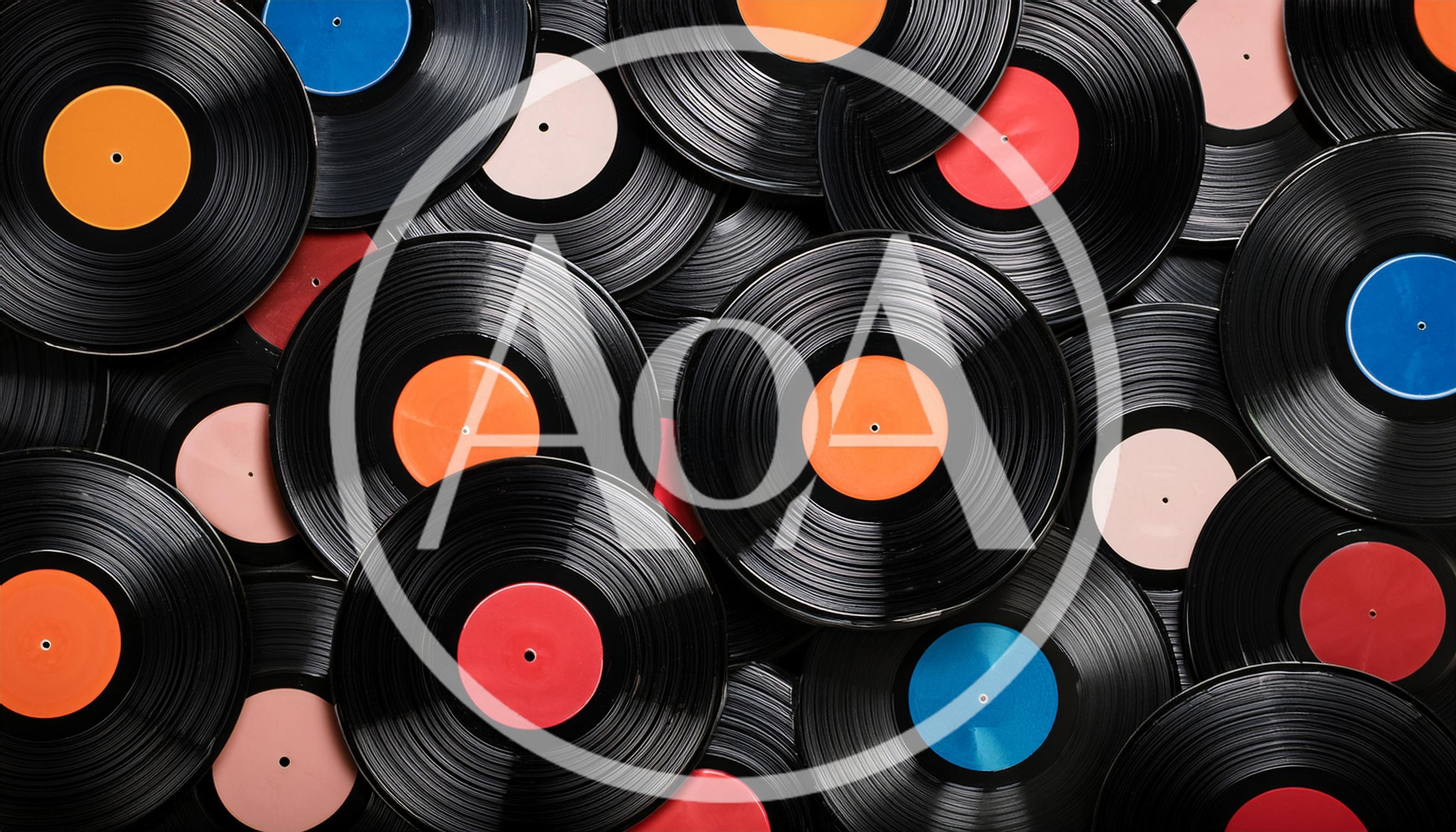 Collection Of Vintage Vinyl Records With Colorful Labels