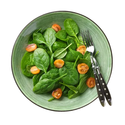 Fresh Spinach And Cherry Tomato Salad In Green Bowl