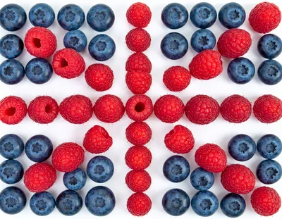 Raspberries And Blueberries Arranged In A Union Jack Pattern
