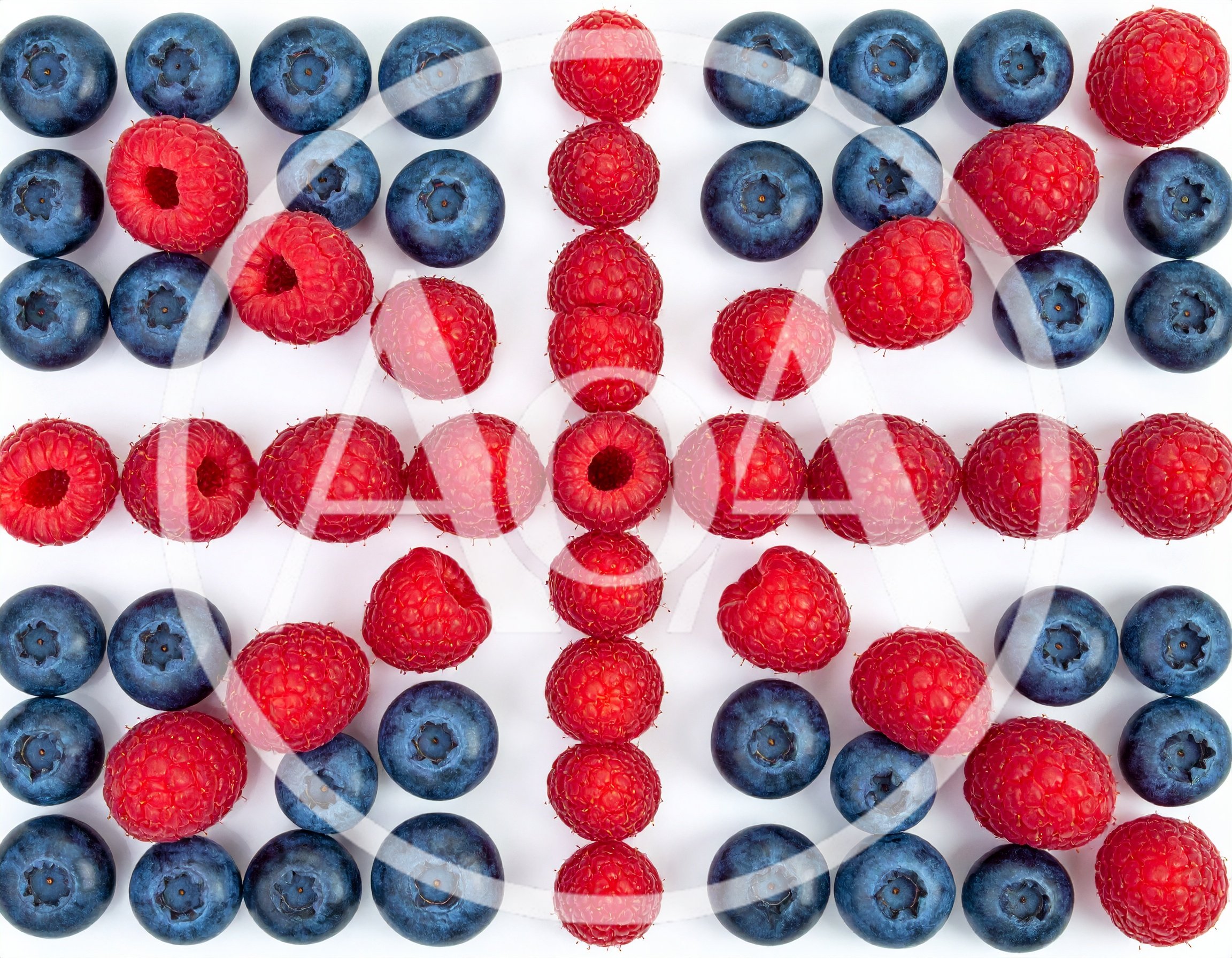 Raspberries And Blueberries Arranged In A Union Jack Pattern