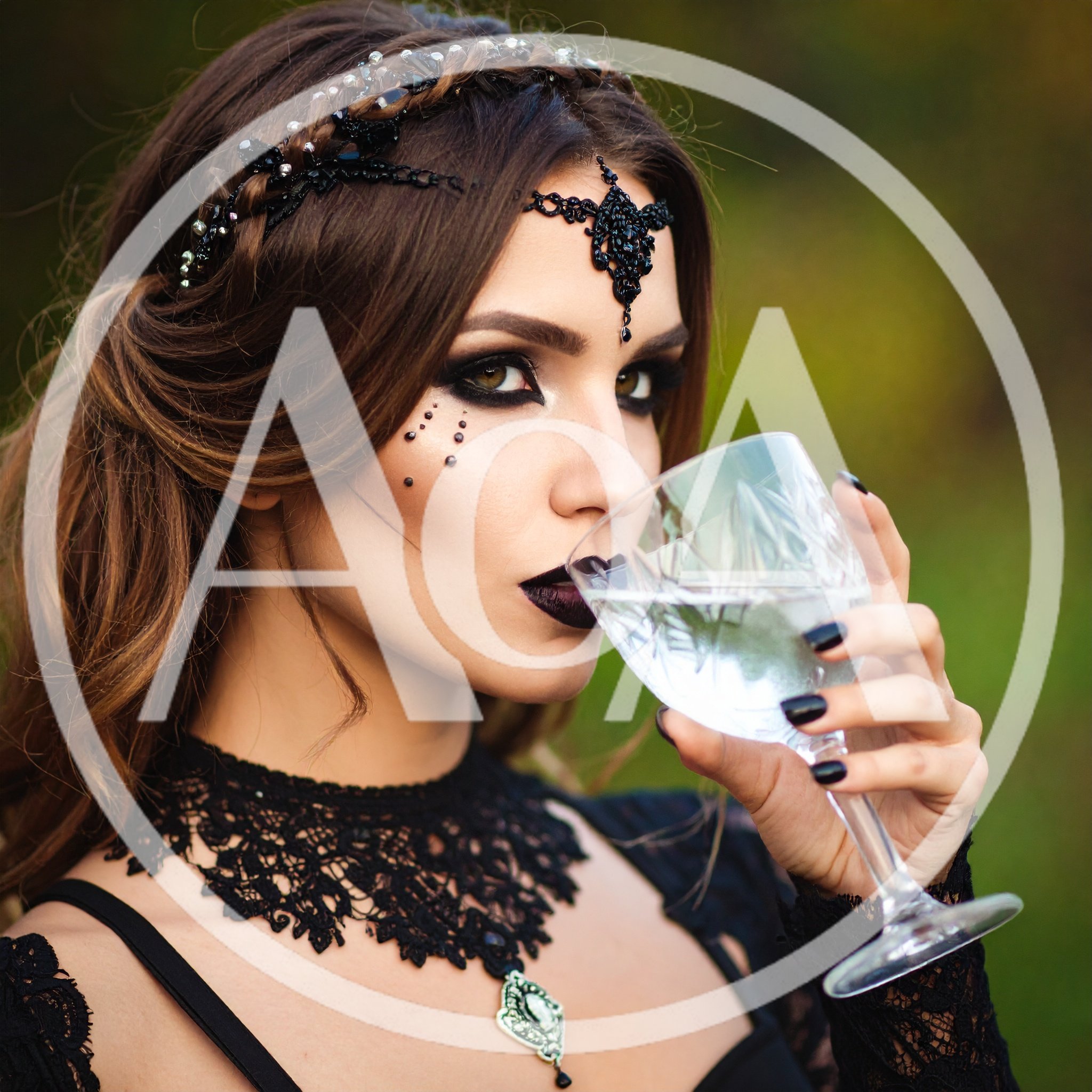 Gothic Woman Drinking From A Crystal Glass