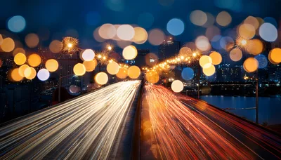 Long Exposure Light Trails On A Busy City Bridge