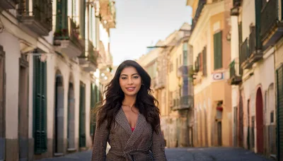 Young Woman Walking Through A Historic Italian Street