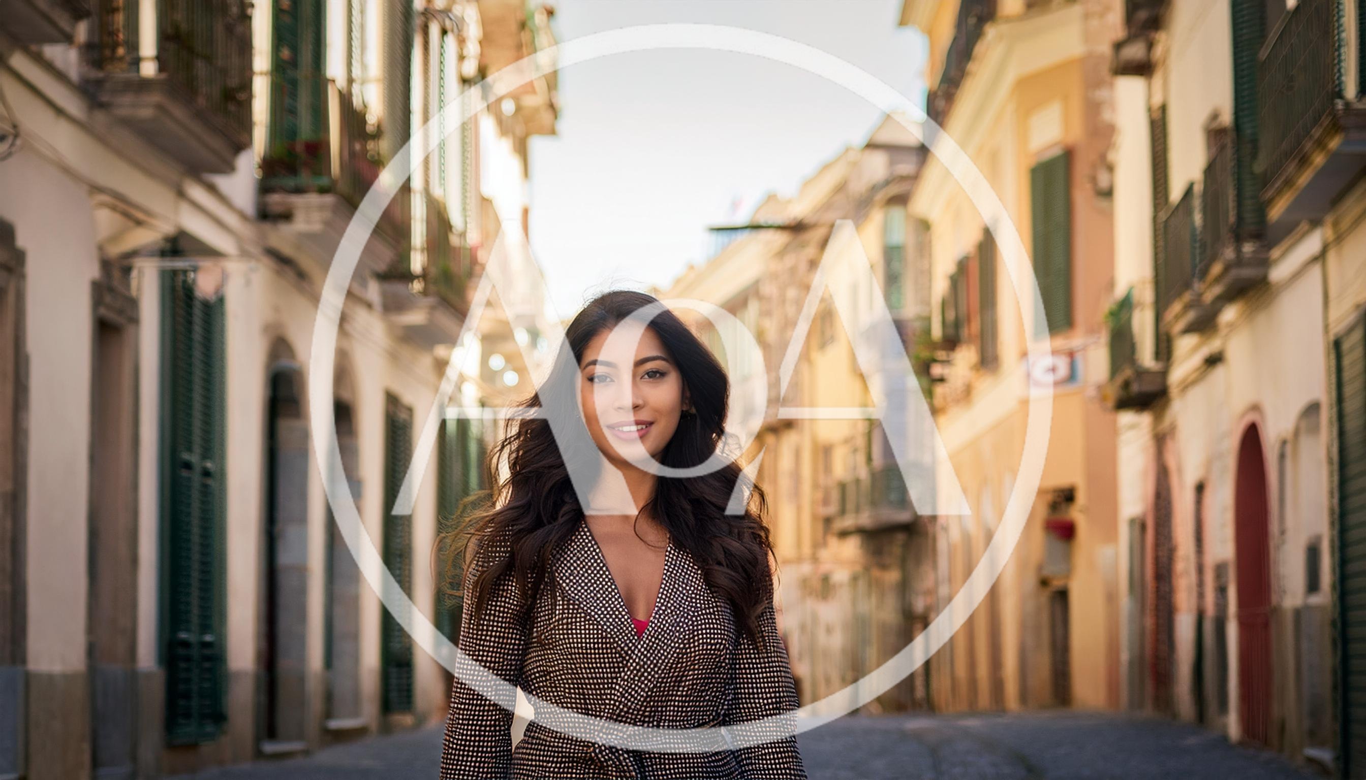 Young Woman Walking Through A Historic Italian Street