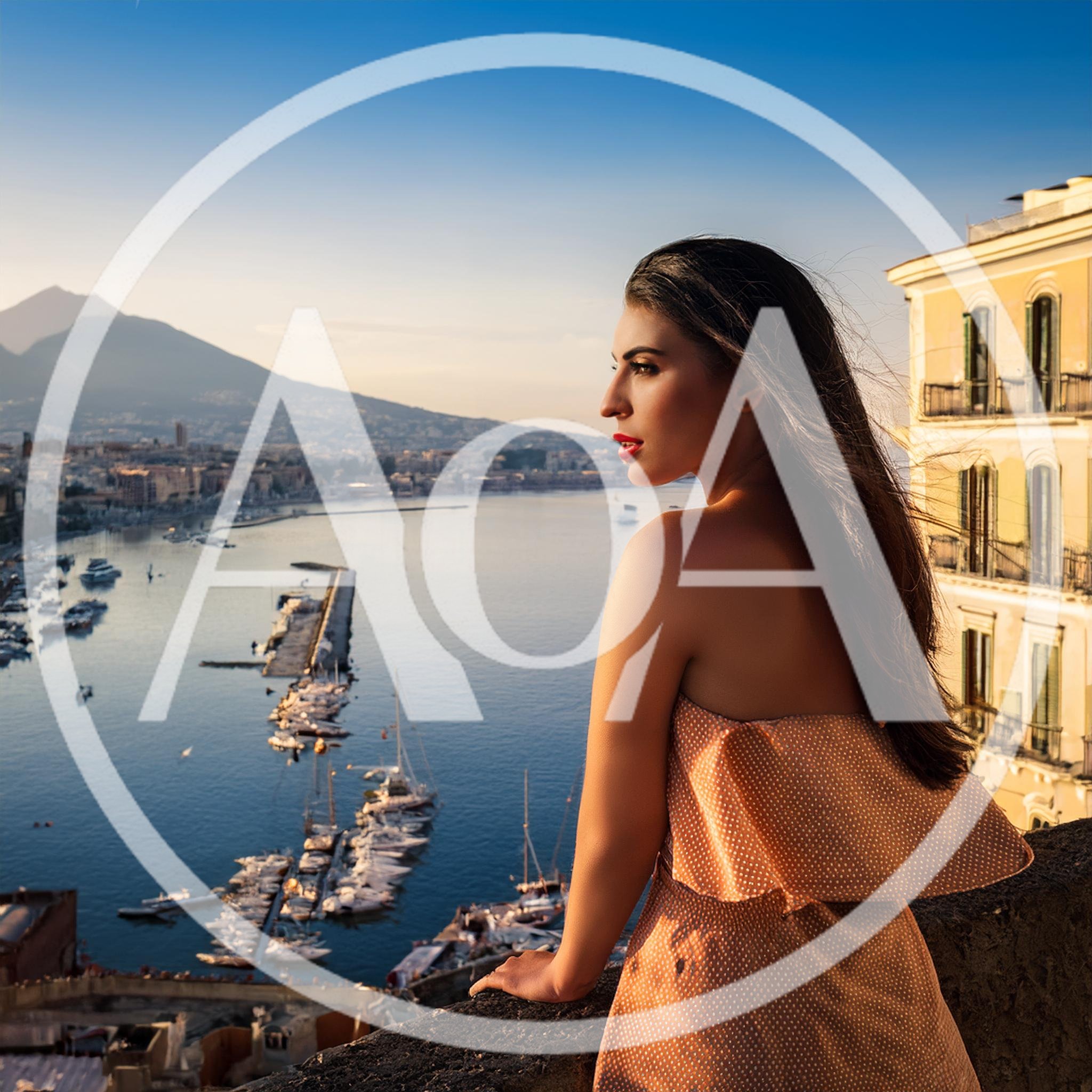 Woman Looking Over The Bay Of Naples At Sunset