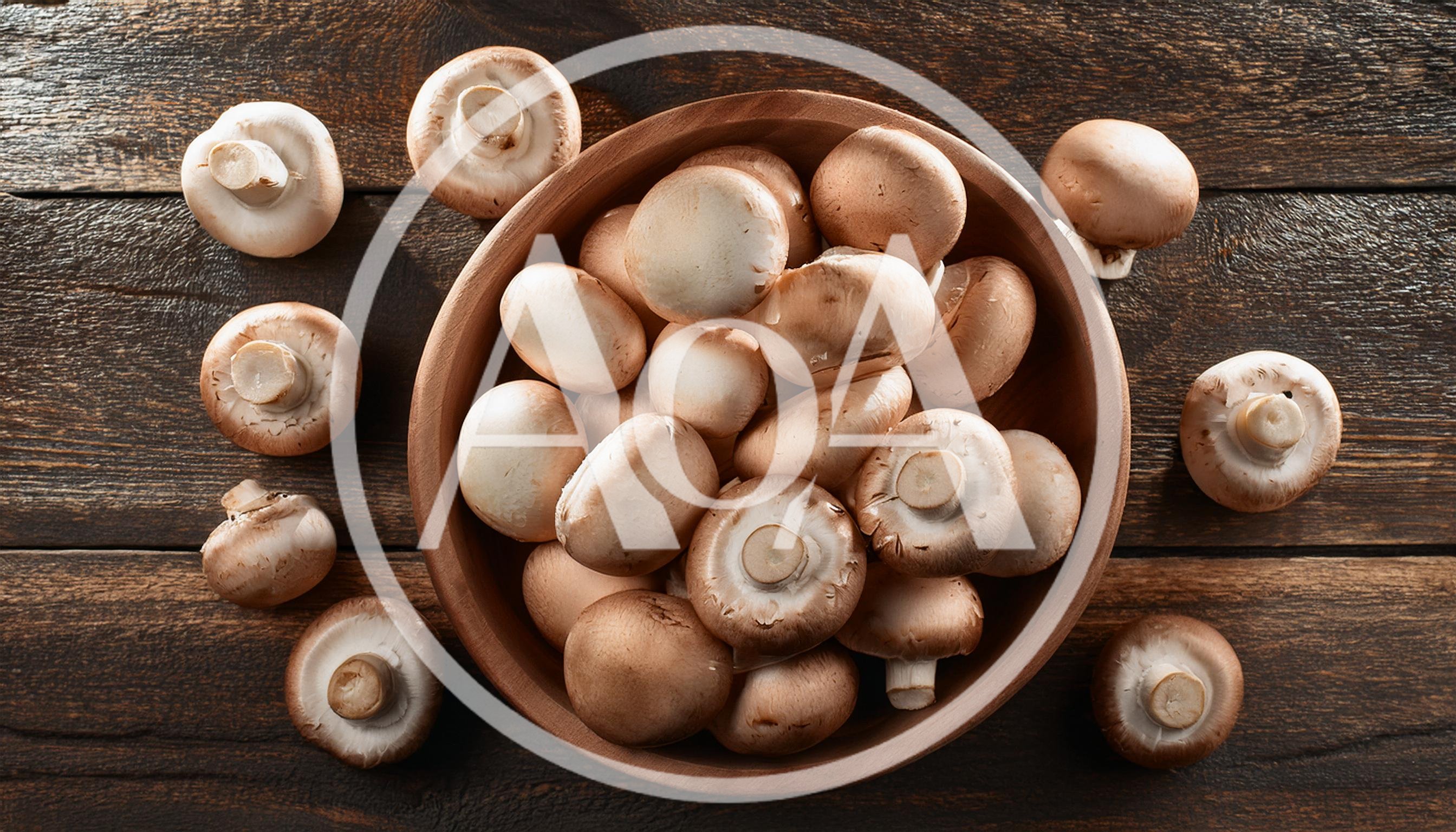 Fresh Brown Cremini Mushrooms In A Wooden Bowl