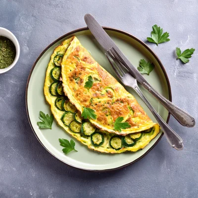 Zucchini Omelet Served on a Green Plate
