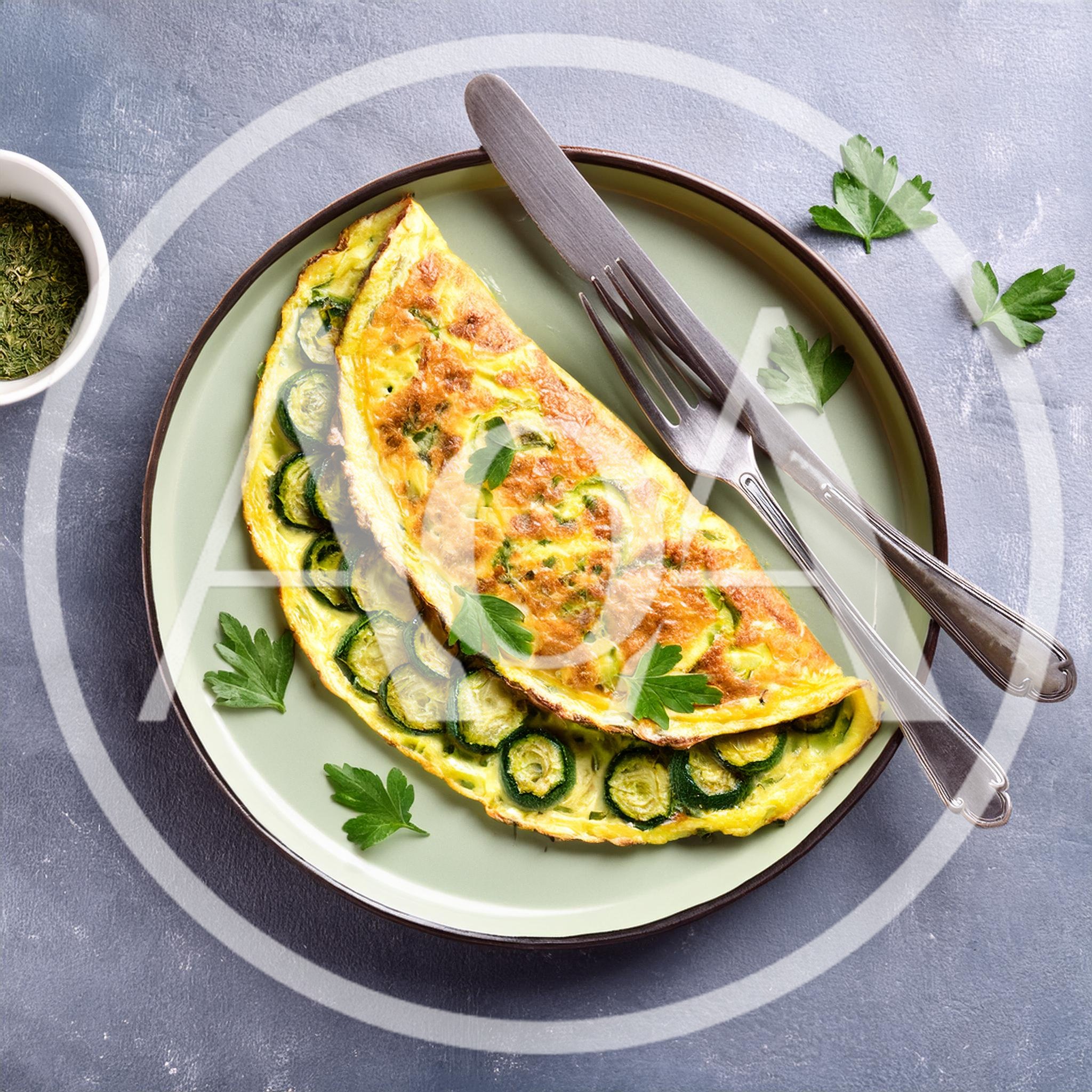Zucchini Omelet Served on a Green Plate