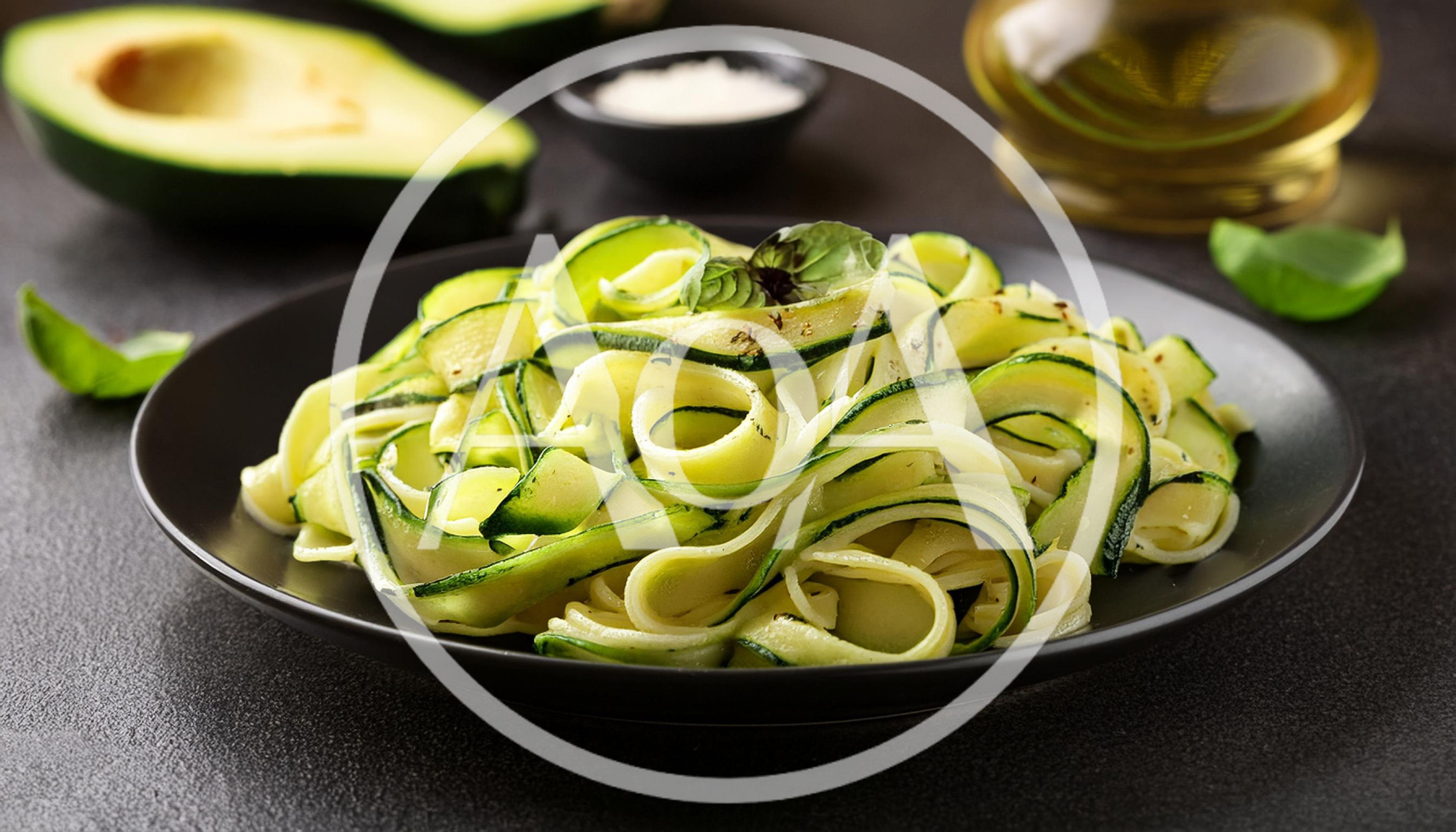 Zucchini Noodles Served on a Black Plate
