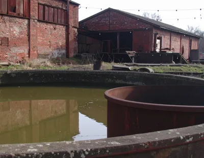 Abandoned Industrial Site With Circular Water Tank