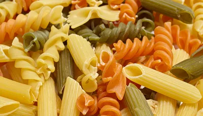 Assorted Dry Tricolor Pasta Shapes Close Up