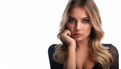 Portrait Of A Beautiful Blonde Woman With Blue Eyes