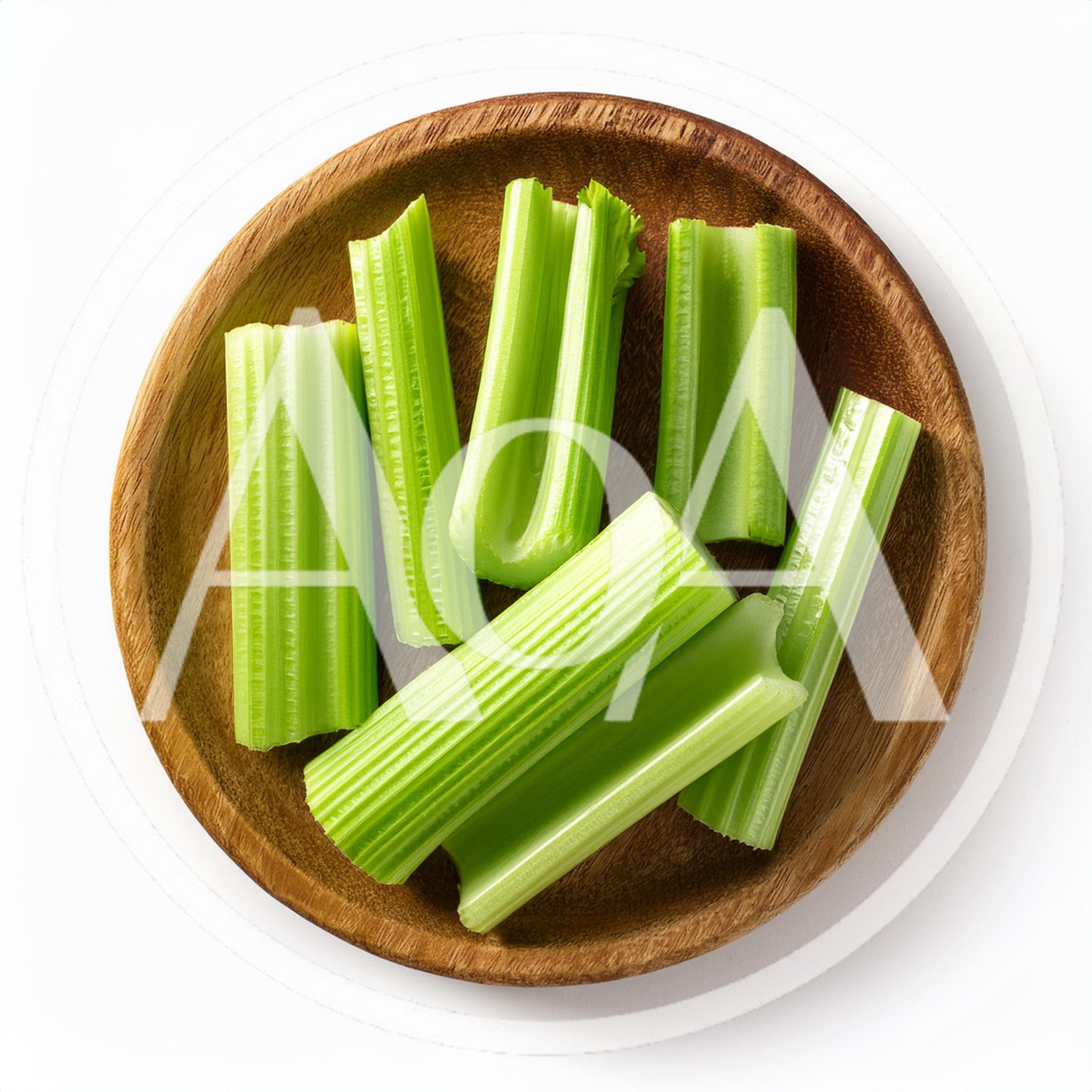 Fresh Celery Sticks On A Wooden Plate