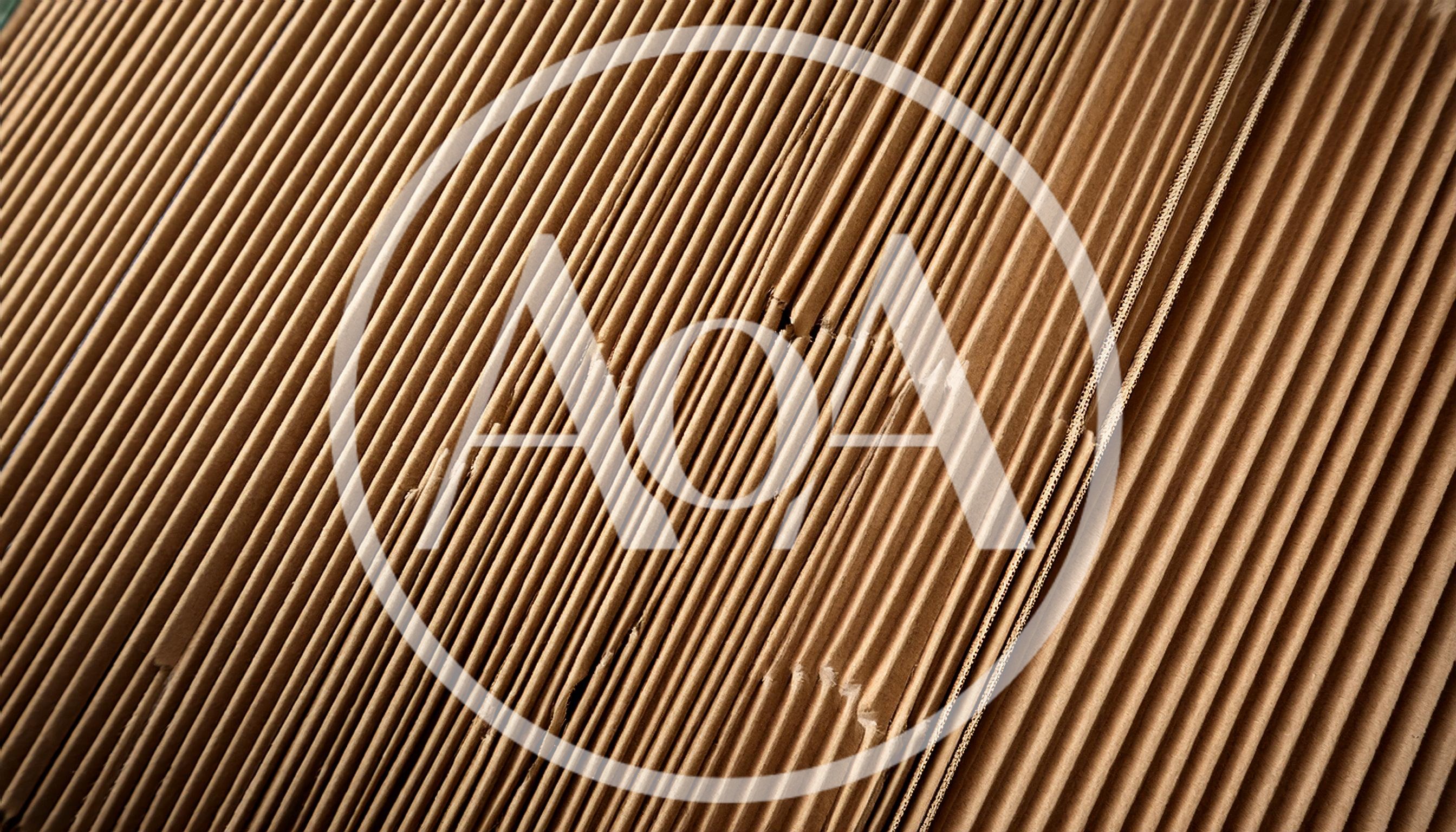 Close Up Of Stacked Corrugated Cardboard Sheets