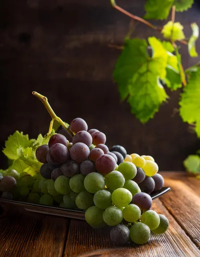 Fresh Cluster Of Mixed Red And Green Grapes