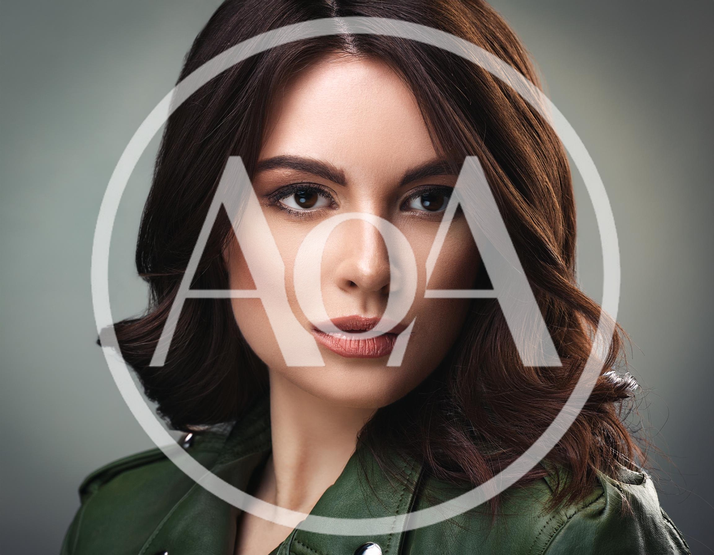 Portrait Of A Beautiful Woman In A Green Jacket