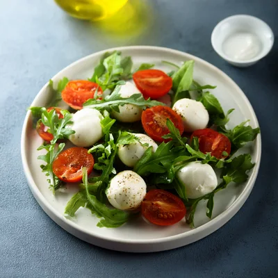 Fresh Caprese Salad With Mozzarella And Cherry Tomatoes