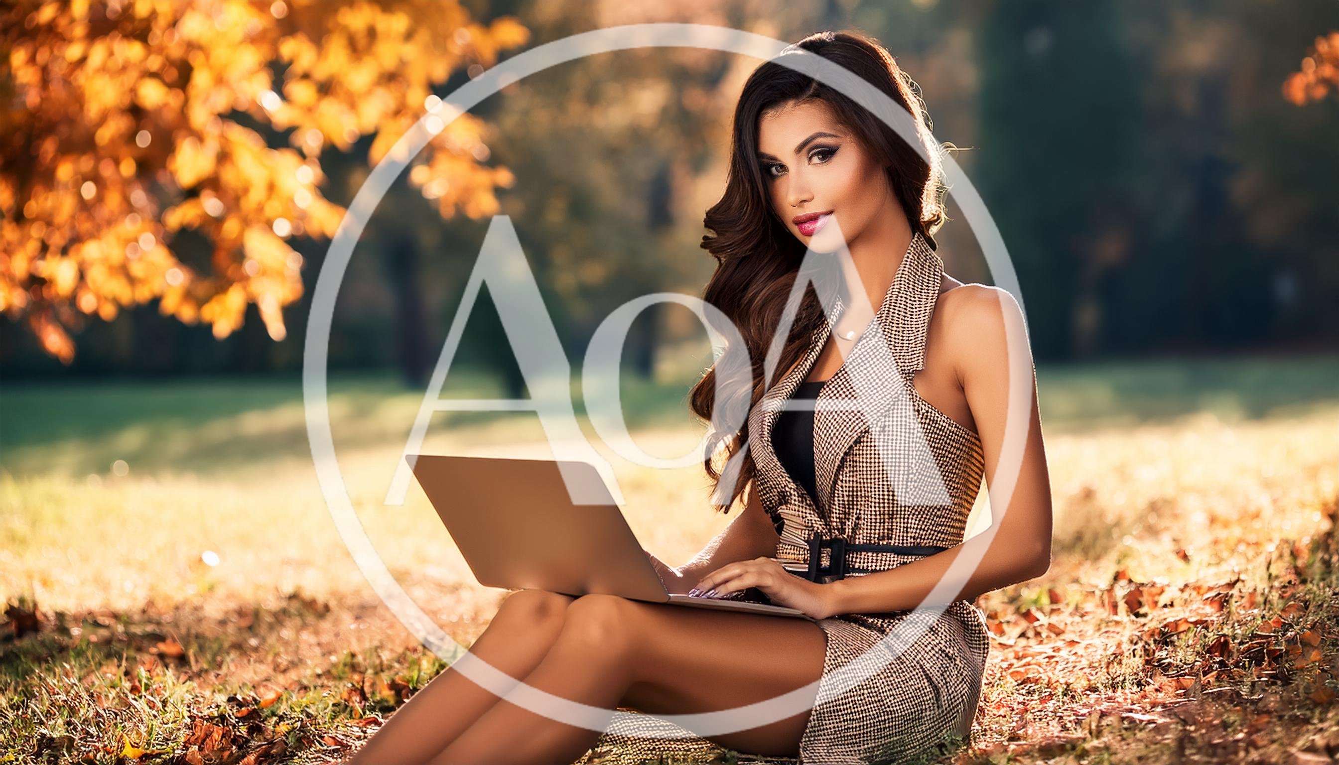 Beautiful Woman Working On Laptop In Autumn Park