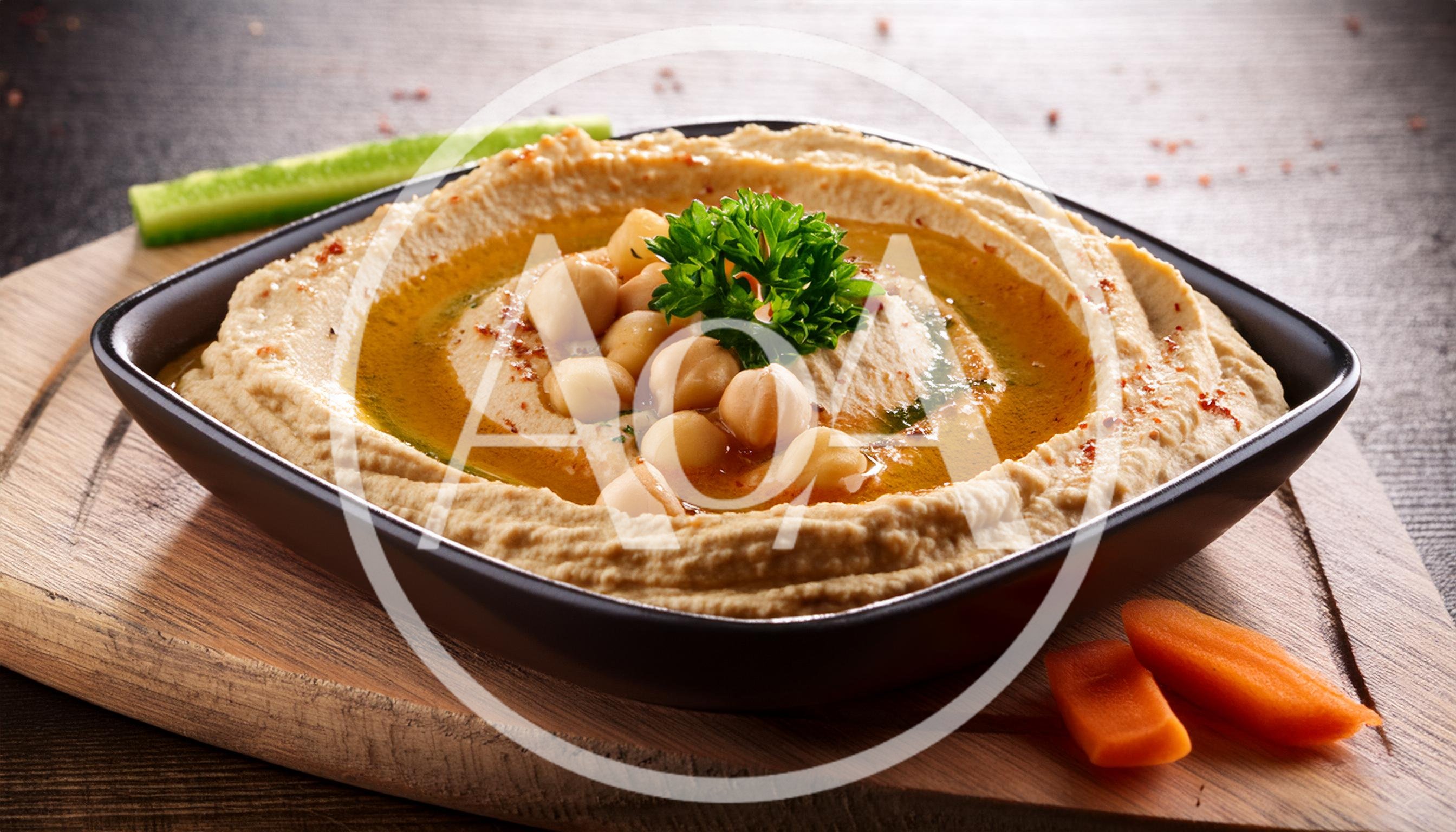 Bowl Of Hummus With Chickpeas And Olive Oil