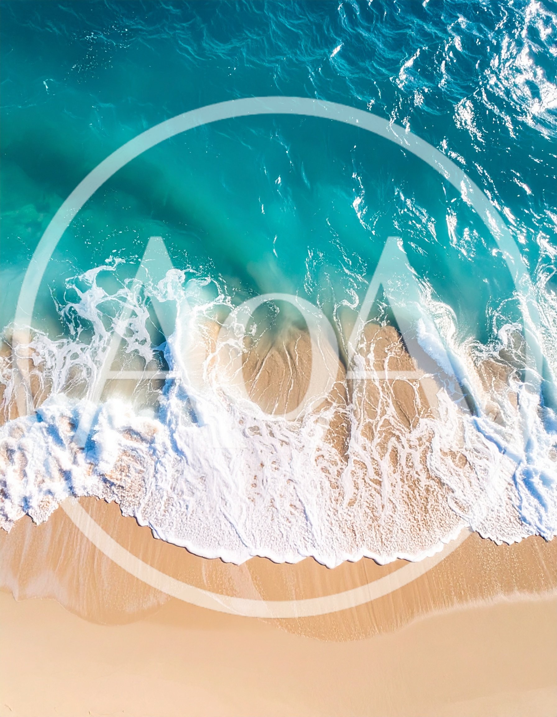 Aerial View Of Turquoise Ocean Waves Crashing On Beach