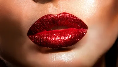 Close Up Of Woman With Glittery Red Lipstick