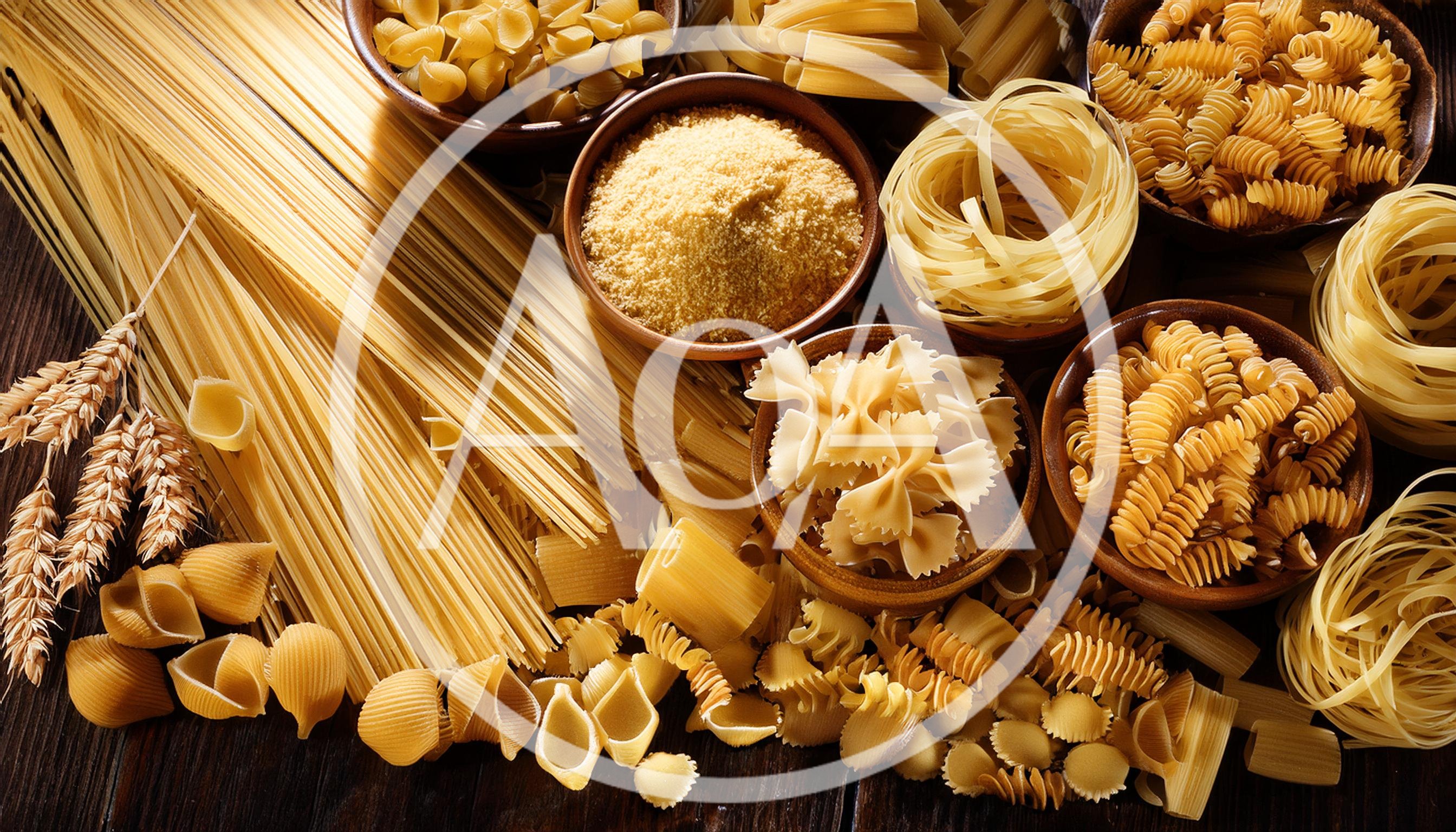 Assorted Dry Pasta Varieties With Wheat Stalks