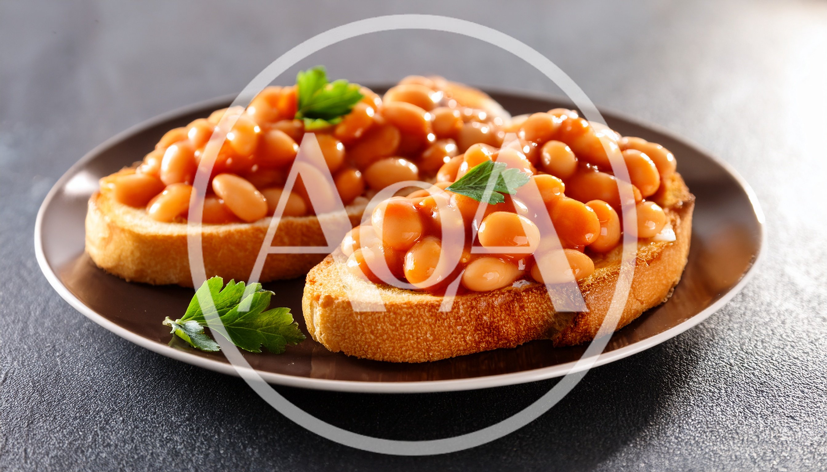 Two Slices Of Toast With Baked Beans