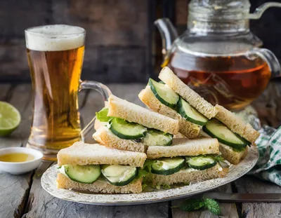 Cucumber Sandwiches Served With Tea And Beer