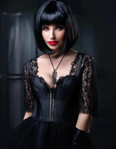 Gothic Woman With Bob Haircut In Black Lace Dress
