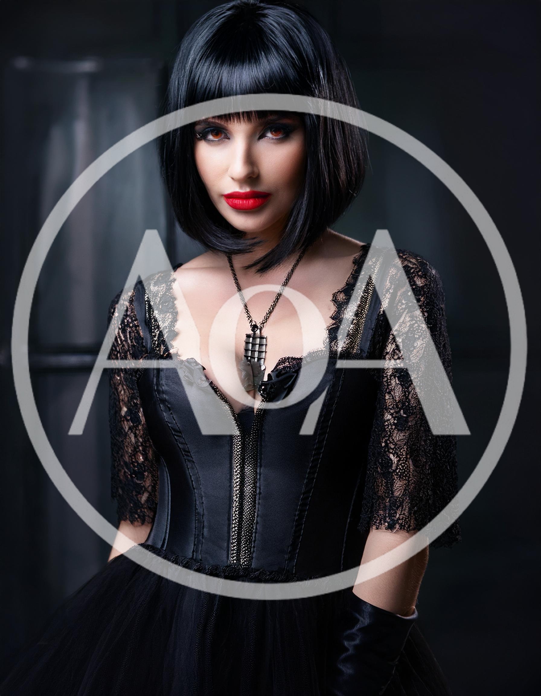 Gothic Woman With Bob Haircut In Black Lace Dress
