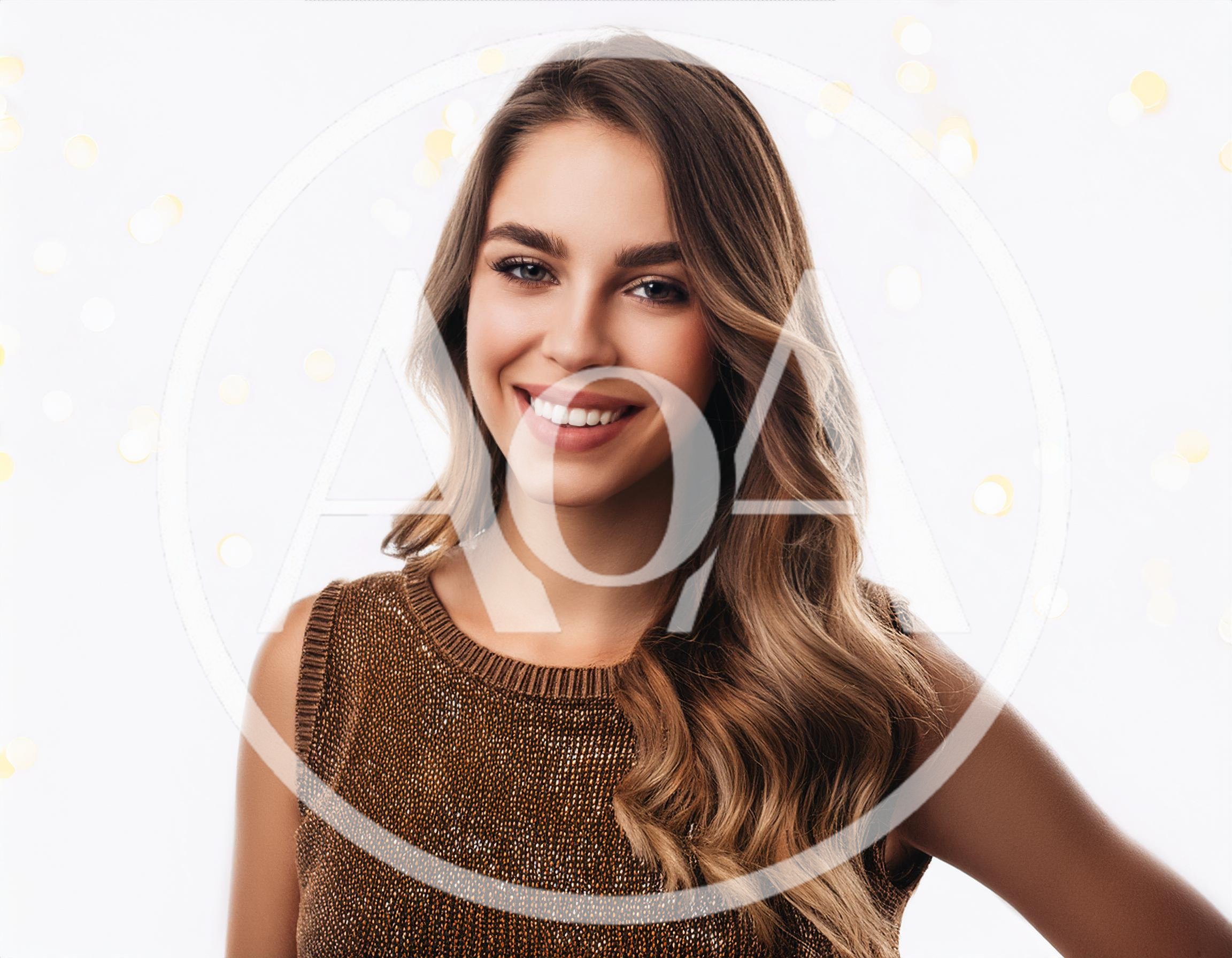 Portrait Of A Smiling Young Woman With Wavy Hair