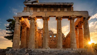 Ancient Greek Temple Ruins At Sunset