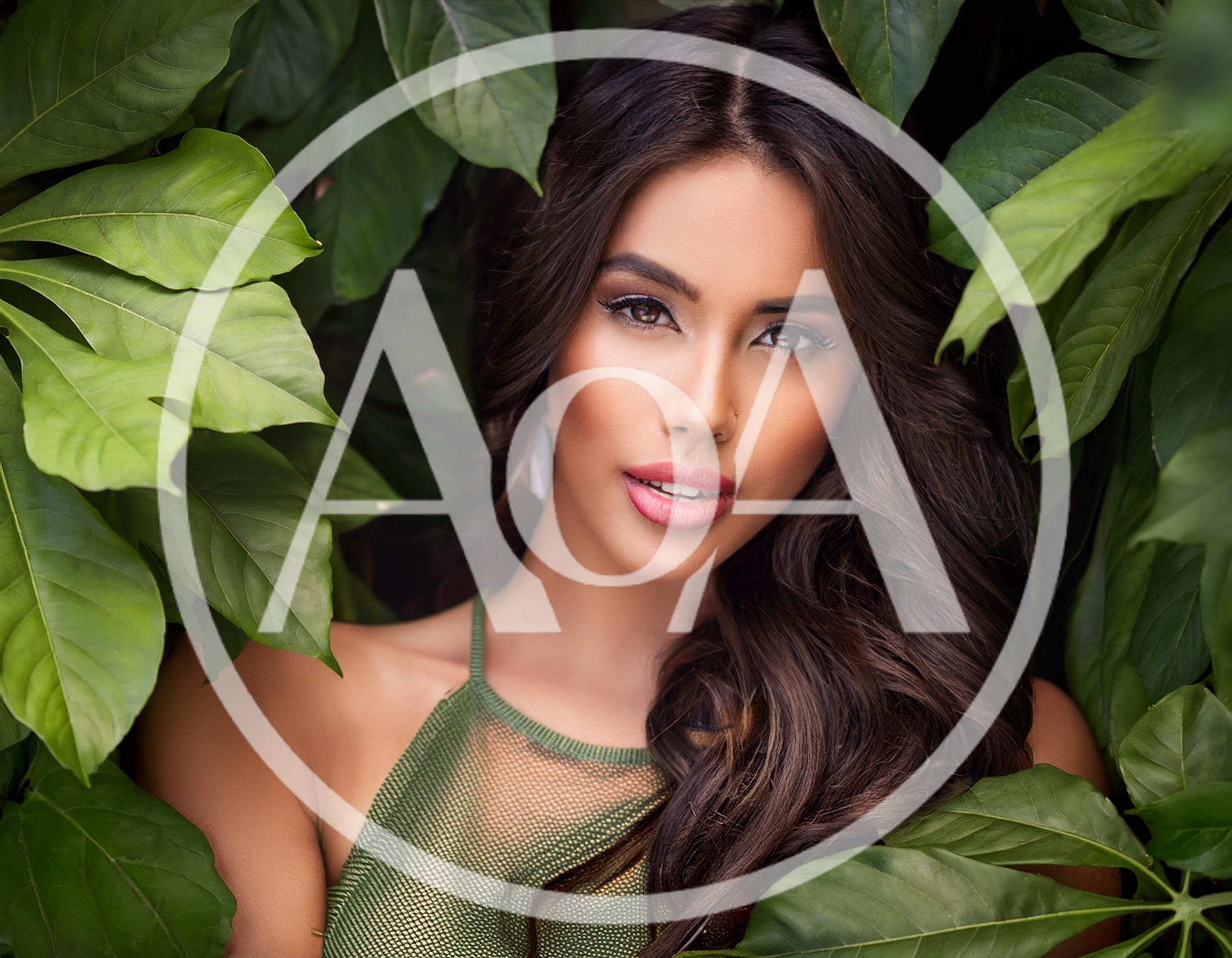 Portrait Of A Beautiful Woman Surrounded By Lush Foliage