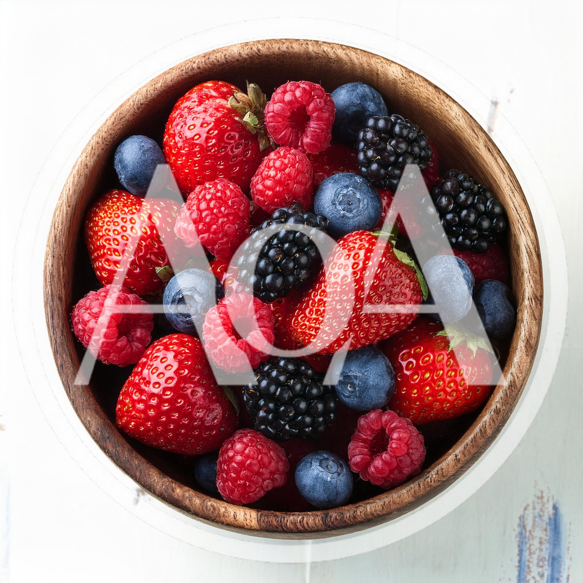 Fresh Mixed Berries In A Wooden Bowl
