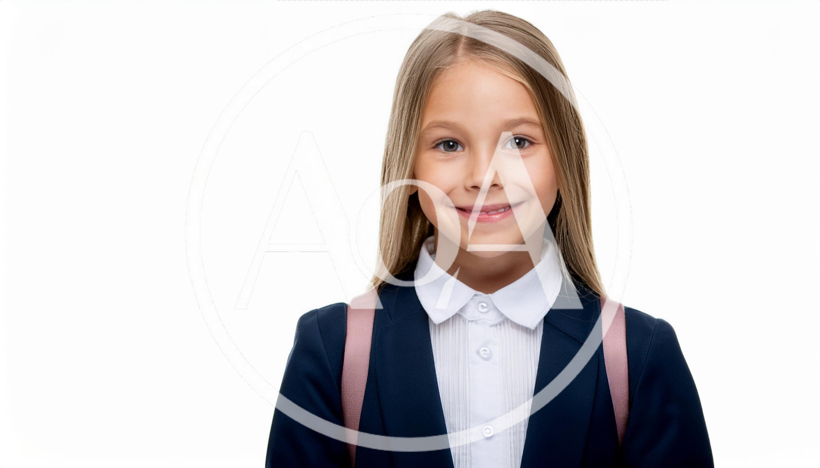 Portrait Of A Smiling Schoolgirl With A Backpack