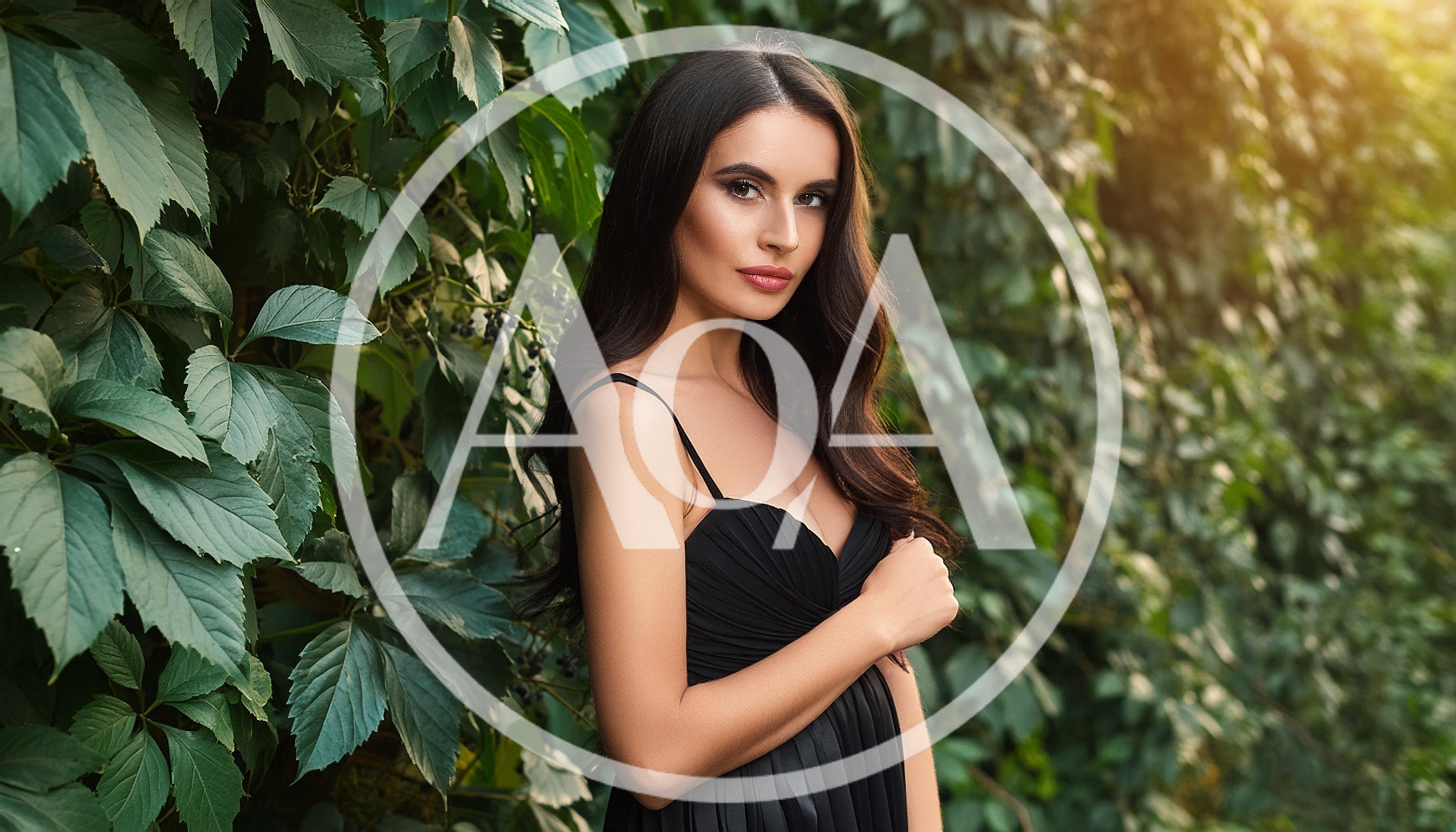 Beautiful Woman Posing In A Black Dress Outdoors
