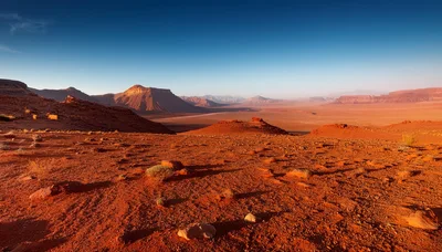 Panoramic View Of The Arid Wadi Rum Desert Landscape