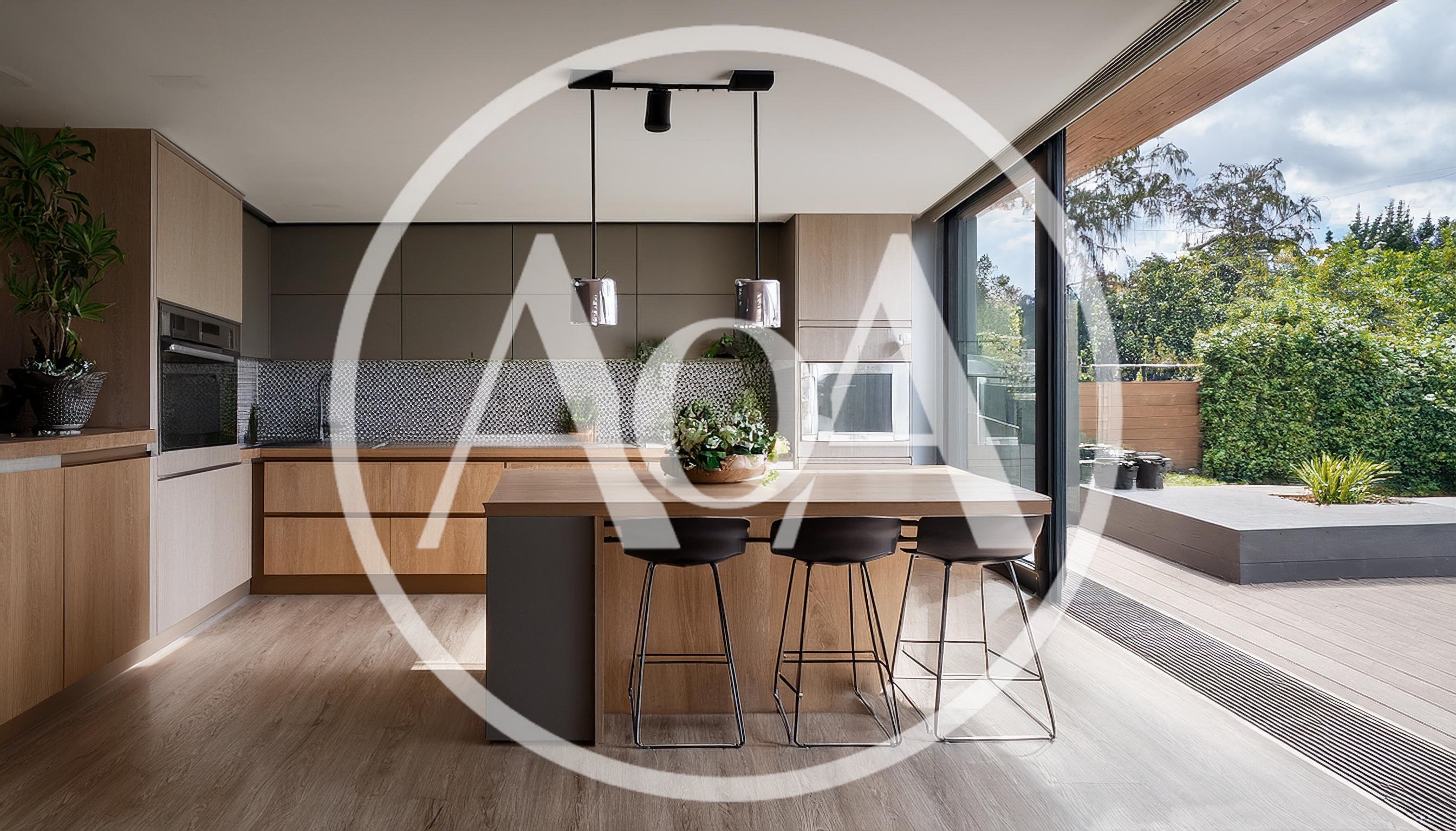 Modern Kitchen Interior With Wooden Island And Bar Stools
