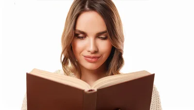 Young Woman Reading A Book Against White Background