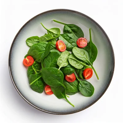 Fresh Spinach And Cherry Tomato Salad In A Bowl