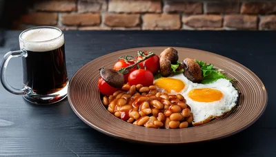 Full English Breakfast With A Glass Of Dark Beer