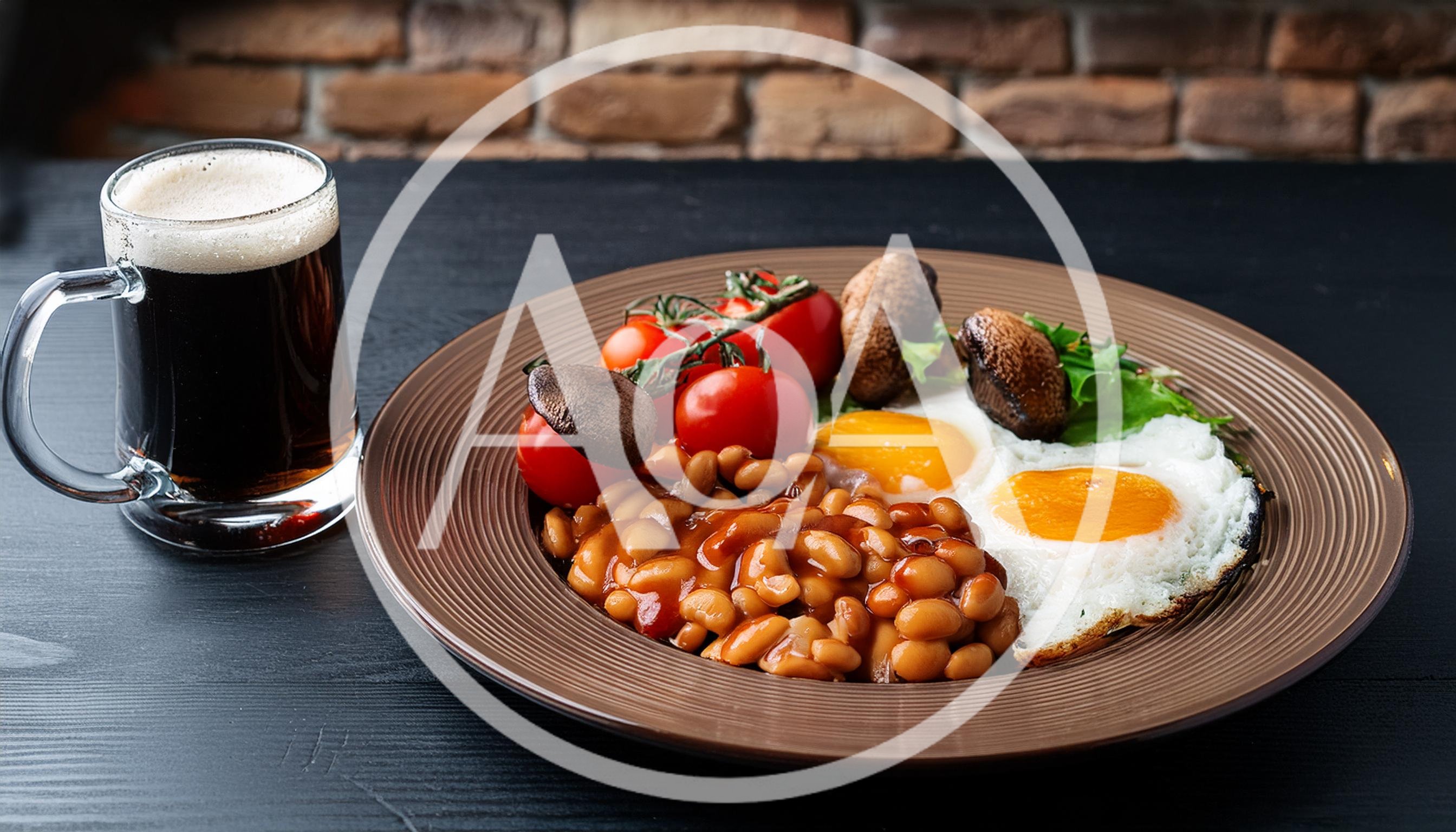 Full English Breakfast With A Glass Of Dark Beer