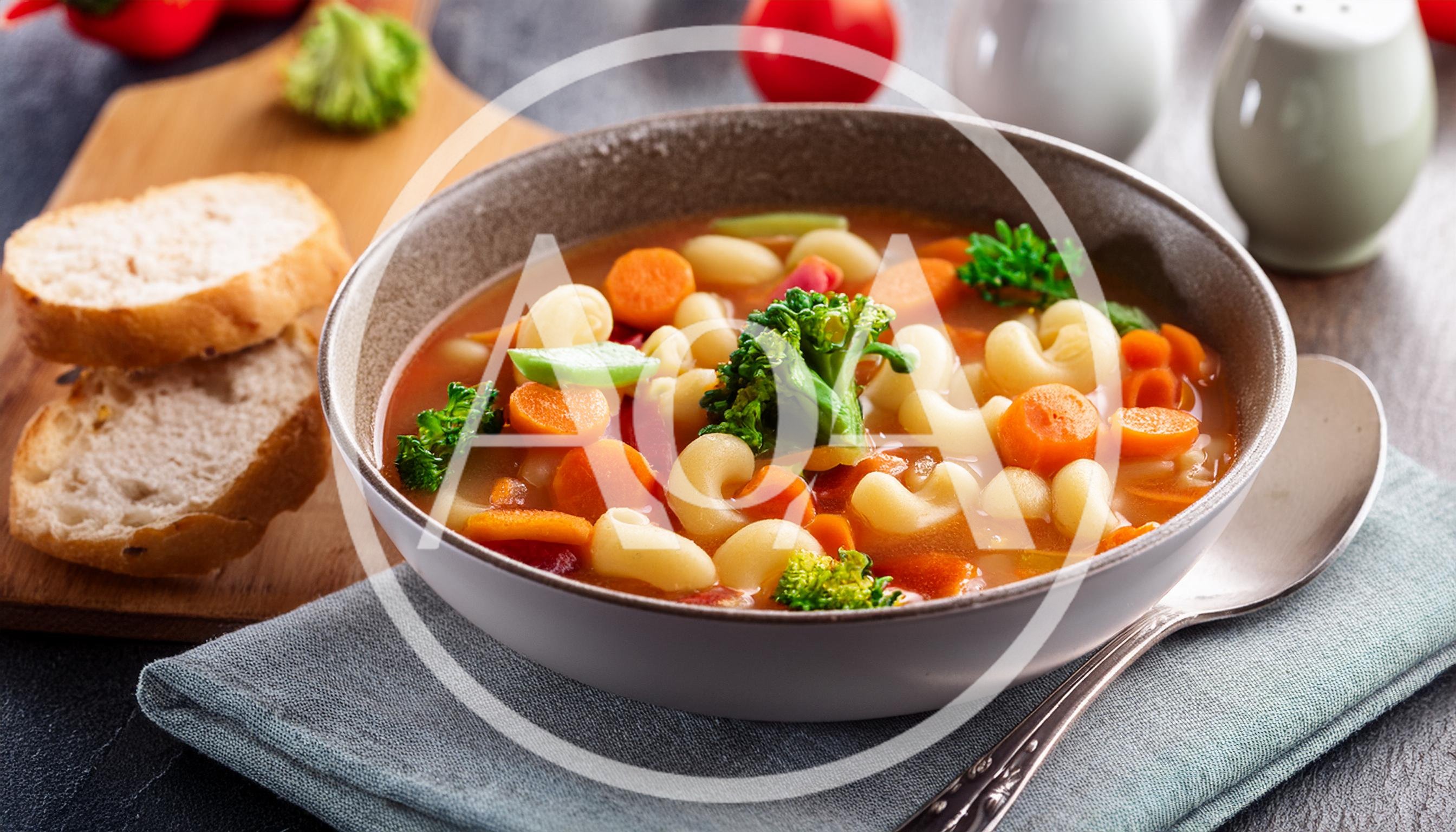 Bowl Of Vegetable Pasta Soup With Bread