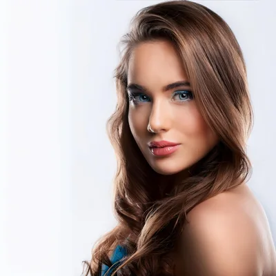 Portrait Of A Beautiful Young Woman With Blue Eyes
