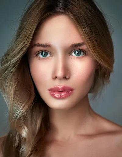 Portrait Of A Beautiful Young Woman With Blonde Hair