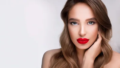 Portrait Of A Beautiful Woman With Red Lips