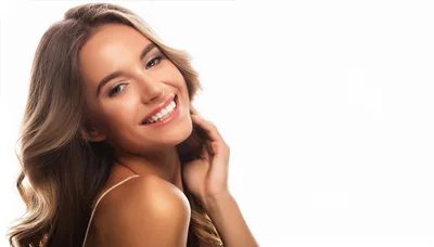 Beautiful Young Woman Smiling With Healthy Radiant Skin