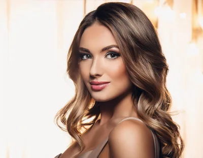 Portrait Of A Beautiful Woman With Wavy Hair