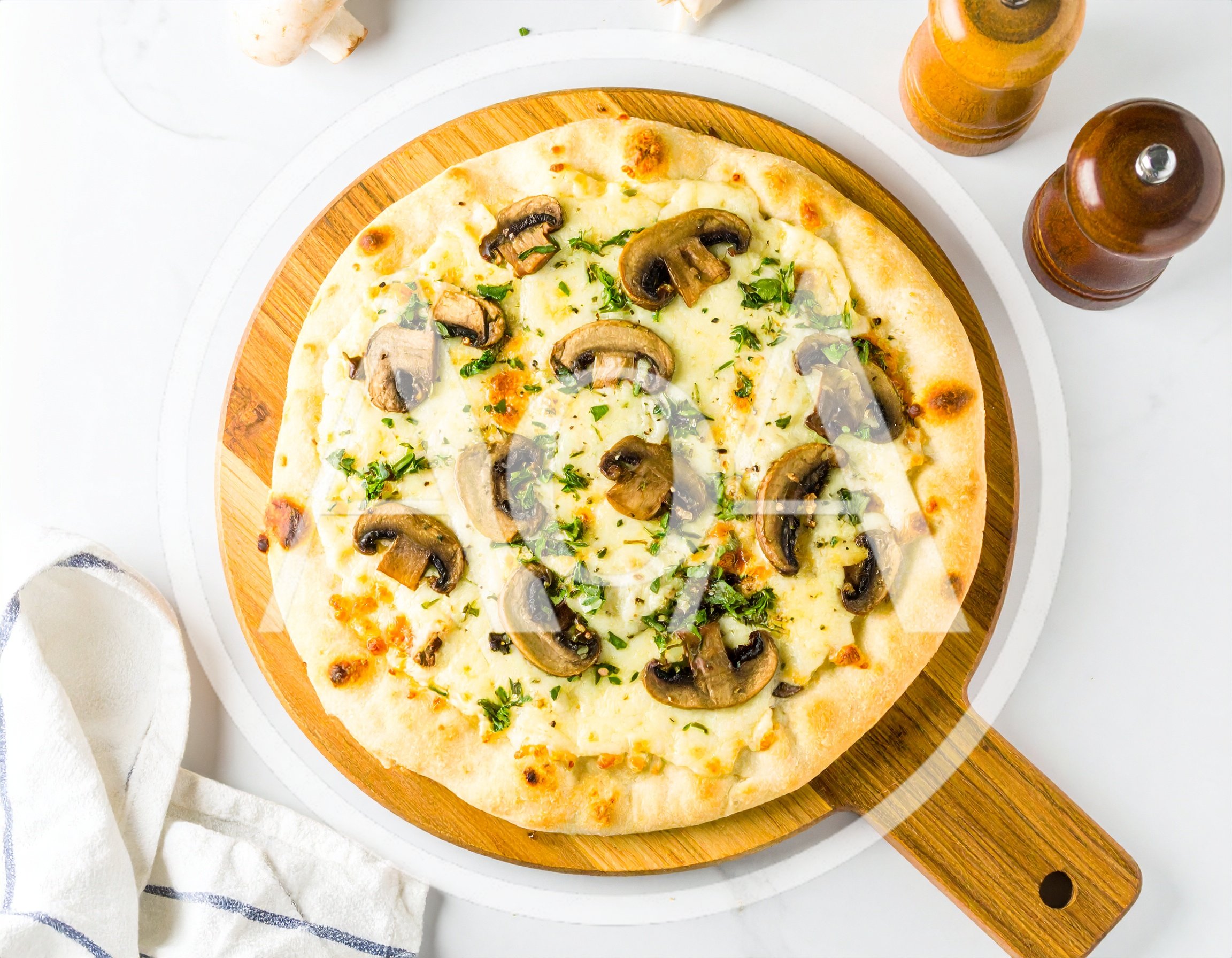 Fresh Mushroom Pizza On A Wooden Serving Board